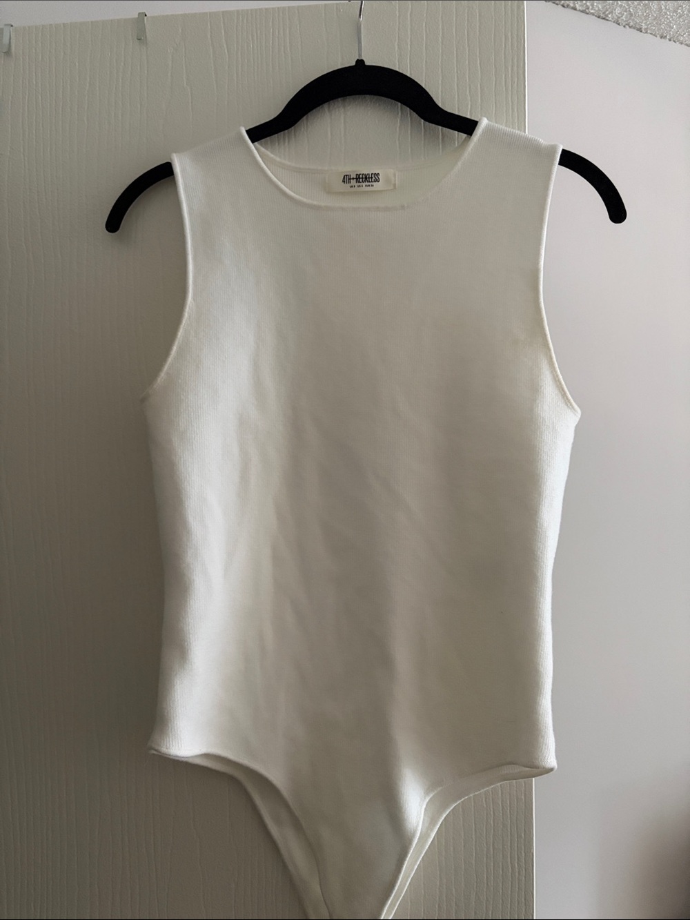 Classic Sleeveless White Bodysuit